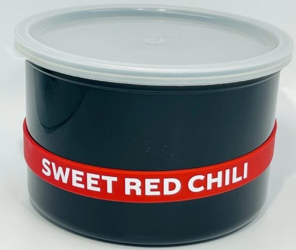 A container of chili with the lid off.