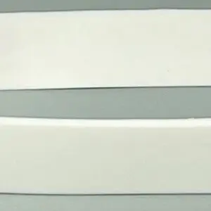 A white strip of paper on top of a table.