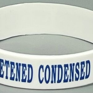 A white bracelet with the words " detened condensed ".