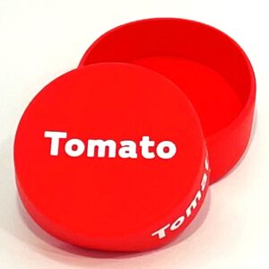 A red box with the word tomato on it.