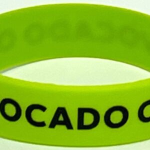 A close up of the wristband with the word " avocado " written on it.