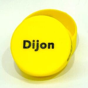 A yellow container with the name dijon on it.