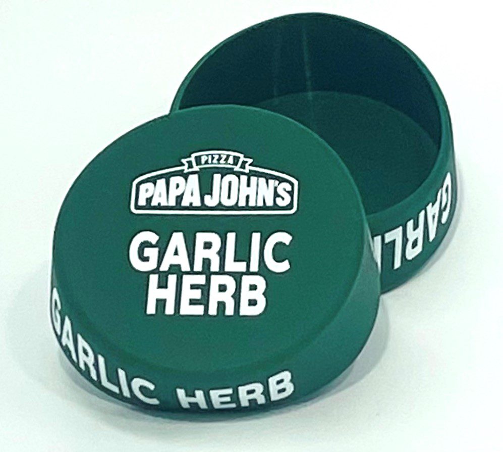 A green container with the words papa john 's garlic herb on it.