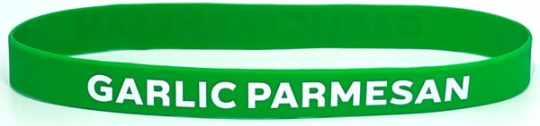 A green wristband with the words " public parks ".