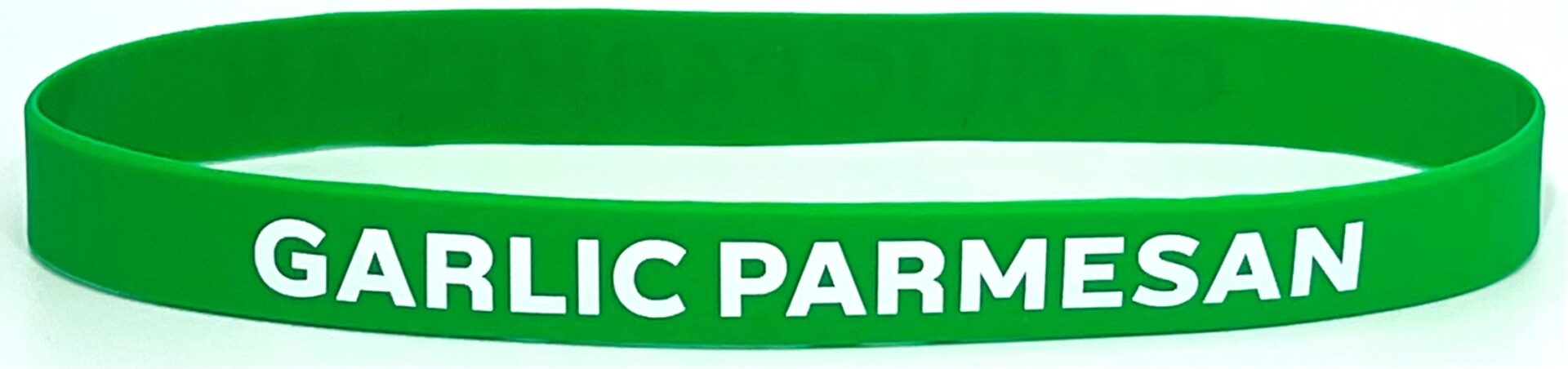 A green wristband with the words " public parks ".