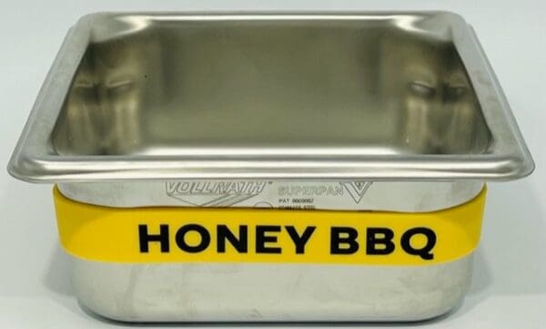 A metal container with the words honey bbq written on it.