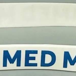 A close up of the medical sign on a band