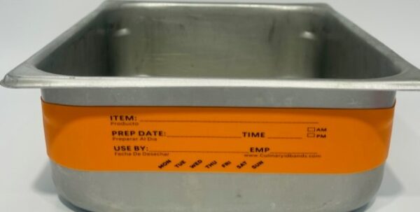 A metal container with an orange label on it.