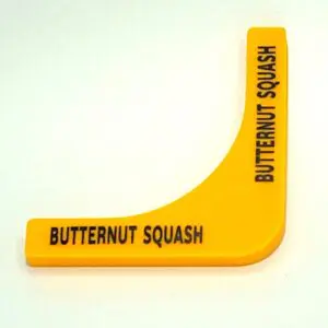 A yellow squash wedge with the words butternut squash written on it.