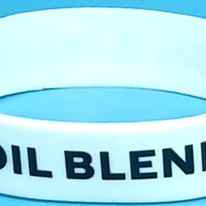 A white bracelet with the words oil blend on it.