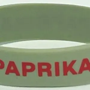 A close up of the wrist band with paprika written on it