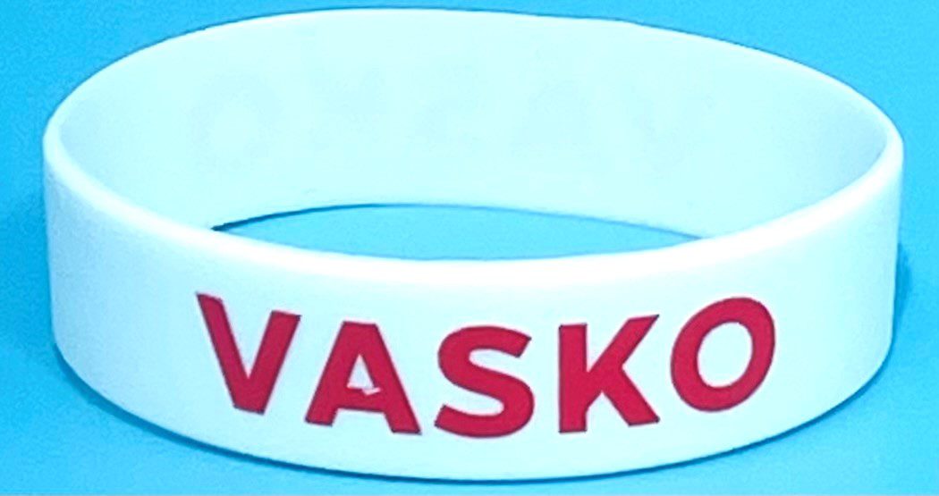 A close up of the word wasko on a bracelet