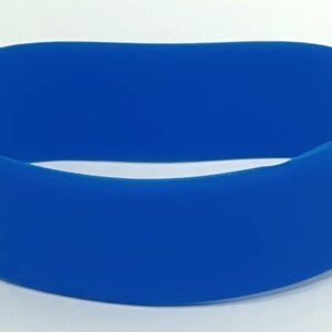 A blue bracelet is shown on top of the table.