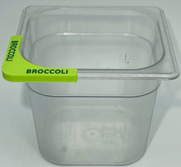 A plastic container with broccoli on it.