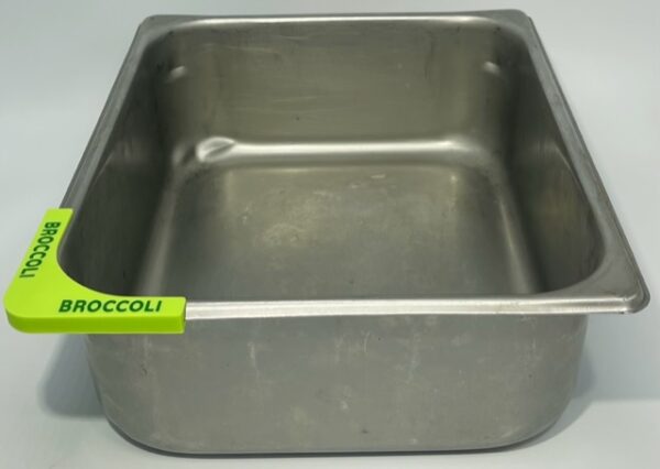 A metal pan with the name of doccui on it.