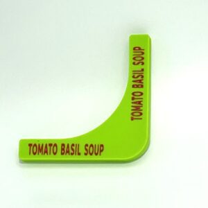 A green tomato basil soup sign on a white background.