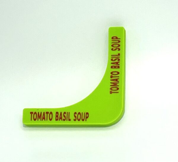 A green tomato basil soup sign on a white background.