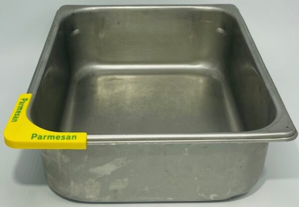 A metal pan with yellow label on it.