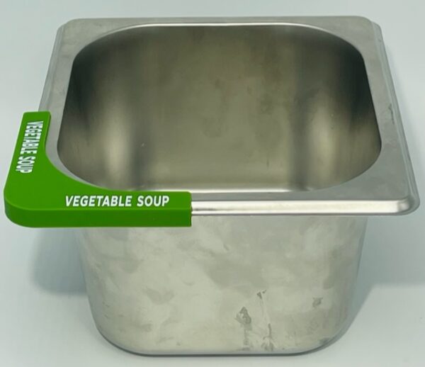 A metal container with the label vegetable soup.