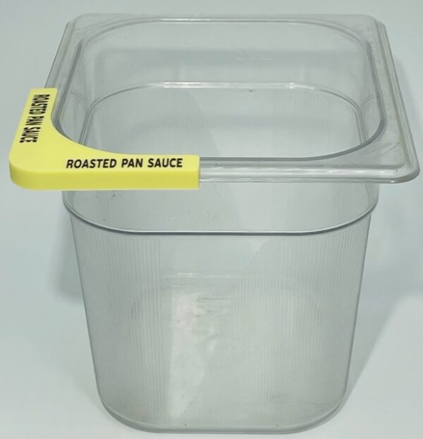 A plastic container with a yellow handle.