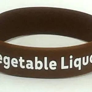 A brown bracelet with the words vegetable liqueurs on it.