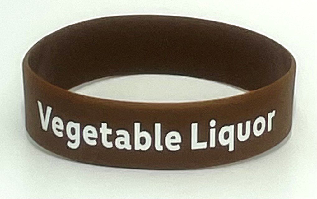 A brown bracelet with the words vegetable liqueurs on it.