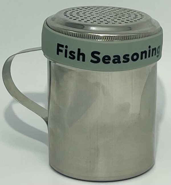 A metal cup with a lid and fish seasoning on top.