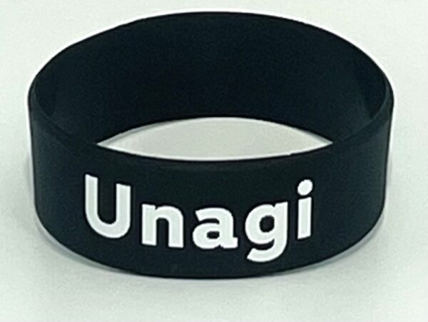 A black wristband with the word unagi written on it.