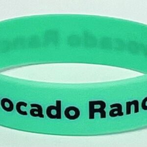 A green bracelet with the words " avocado ranch ".