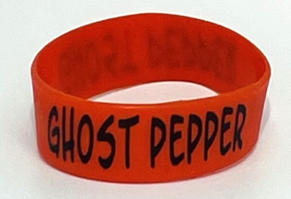 A red band with the words " ghost pepper ".