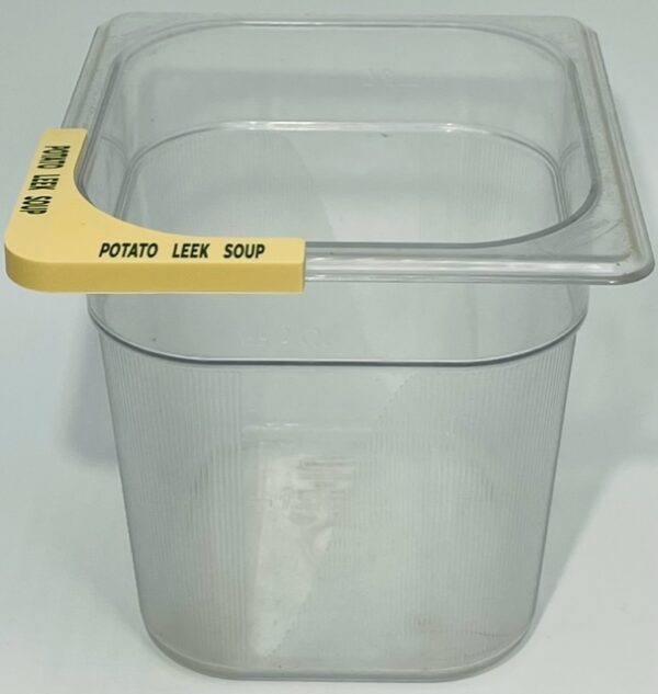 A plastic container with a yellow handle.