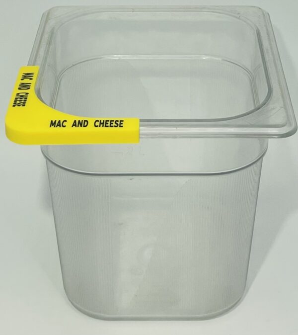 A plastic container with a yellow handle.