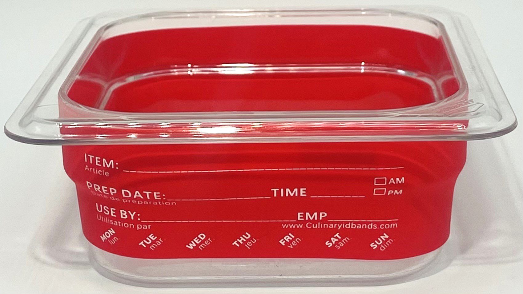 A red container with time and temperature labels inside of it.