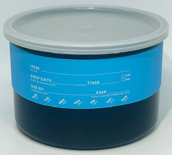 A container of blue paint with the lid off.