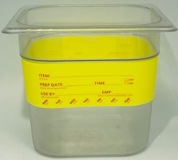 A plastic container with yellow band around it.