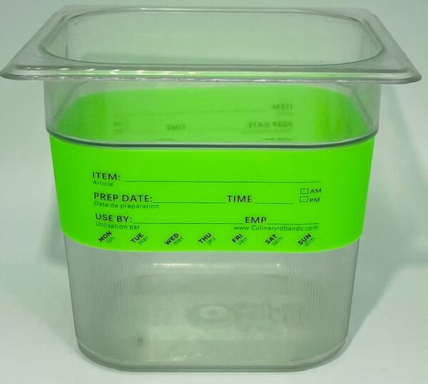 A plastic container with green lid and label.