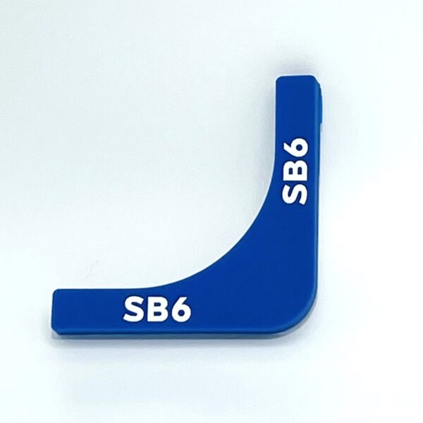 A blue plastic object with the number " sb 6 ".