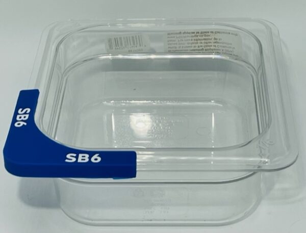 A plastic container with blue handles and lid.