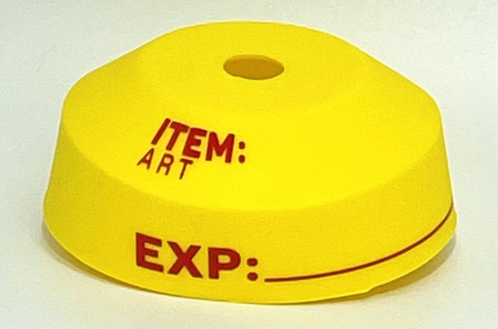 A yellow hat with the word " item art " written on it.