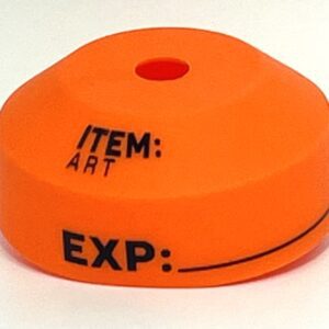 A orange object with black writing on it.