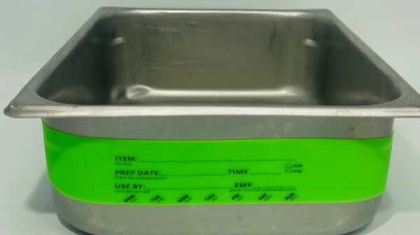 A metal container with green labels on it.