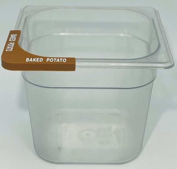 A plastic container with a brown handle.