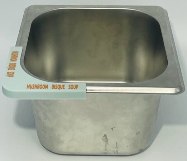 A metal container with a handle on top of it.