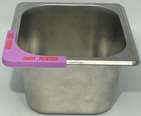 A metal container with a pink handle.