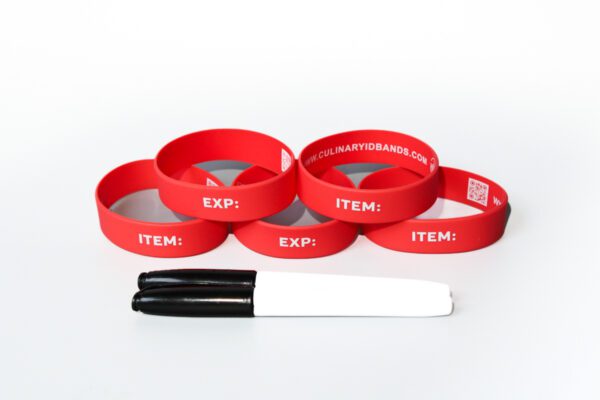 A group of red bracelets with the word " item " written on them.