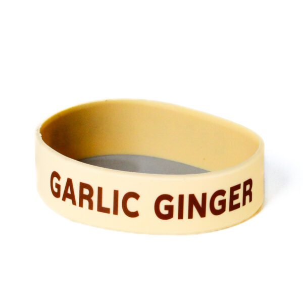 A garlic ginger bracelet is shown on a white background.