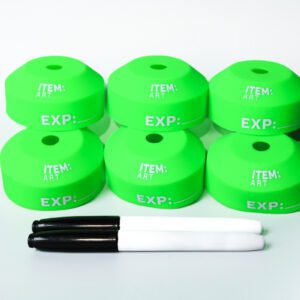 A group of green markers sitting next to each other.