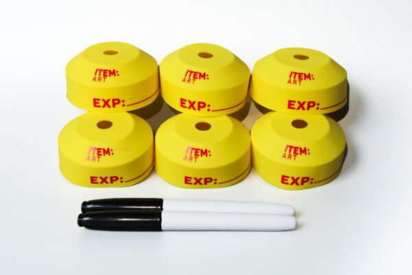 A group of yellow markers and six rolls of tape.