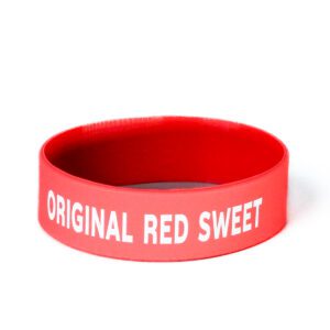 A red wristband with the words " original red sweet ".