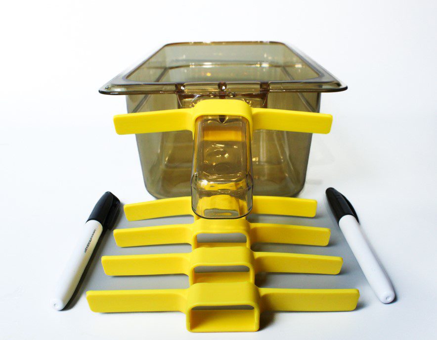 A yellow object is sitting on top of a table.